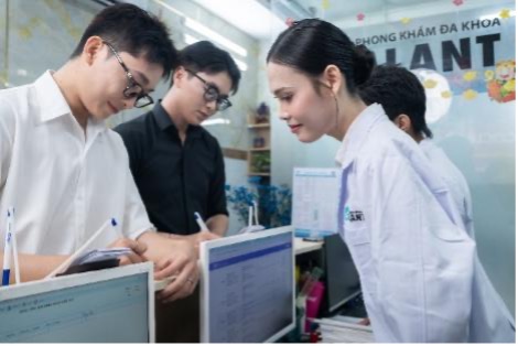 AHF Vietnam Team collaborating in the facility
